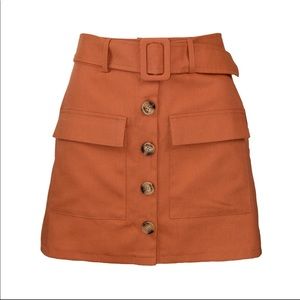 Women’s button front skirt with belt